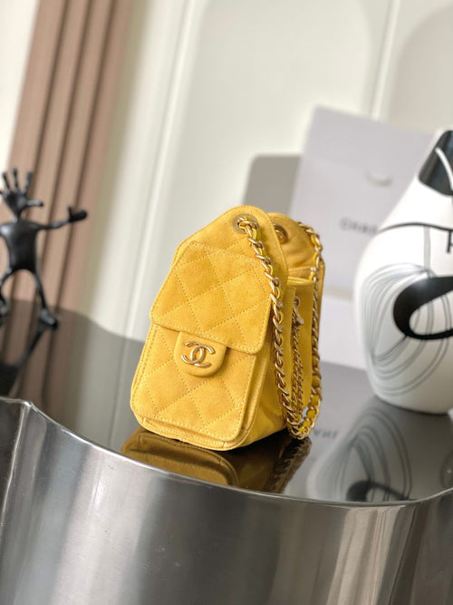 Chanel quilted mini shoulder bag, yellow suede texture, chain strap and flap