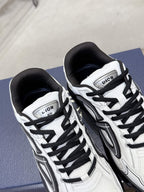White Dior lace-up sneakers with black laces, close-up pair view