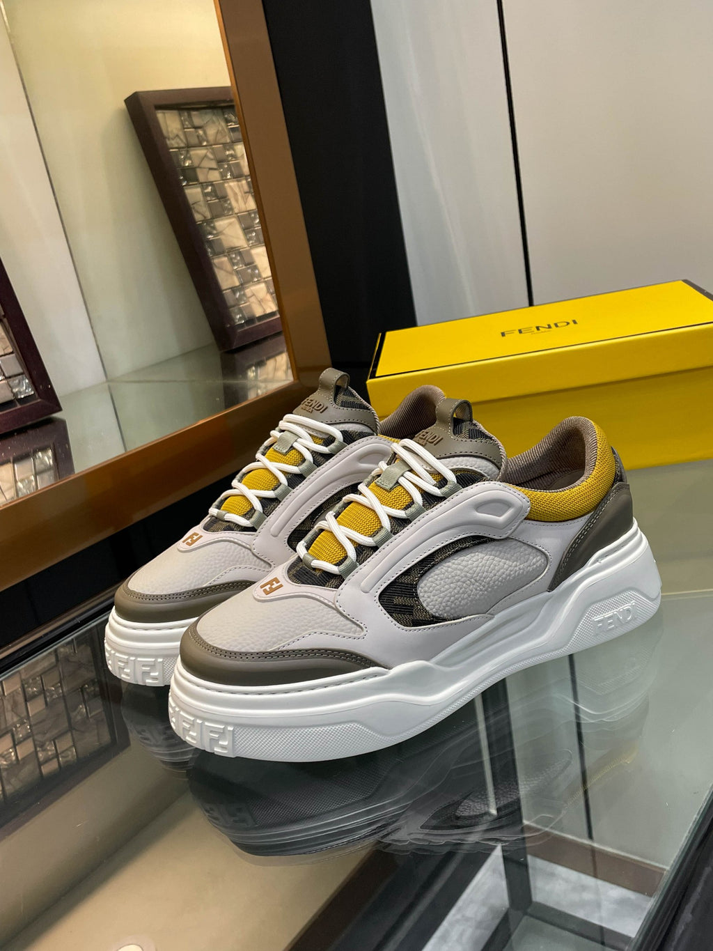 Fendi unisex sneakers in white, gray and yellow with chunky sole and lace-up design