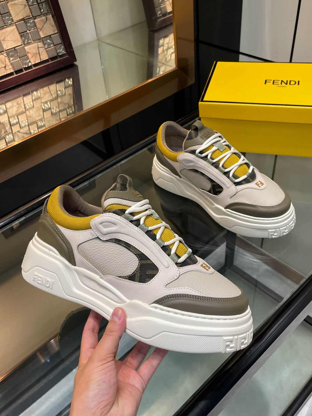 Fendi unisex lace-up sneakers, white and gray uppers with yellow trim, chunky platform sole