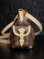 Louis Vuitton monogram canvas mini backpack with white leather front flap and shoulder strap