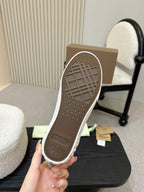 Burberry sneaker outsole tread, held in hand with textured rubber grip
