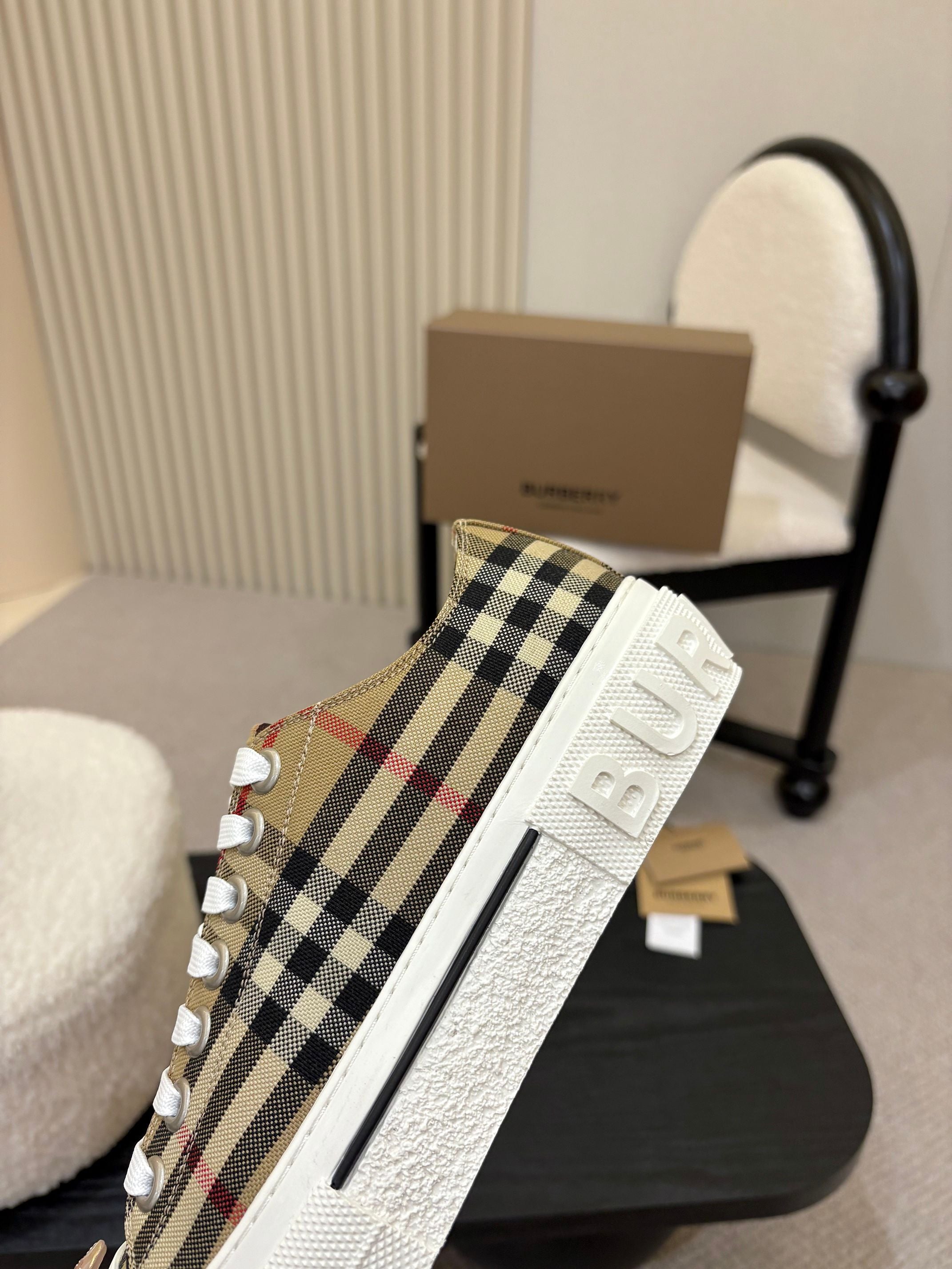 Burberry sneakers heel and side view, plaid upper with white logo patch