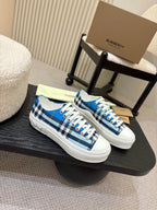 Burberry low-top sneakers with blue plaid uppers and white cupsole