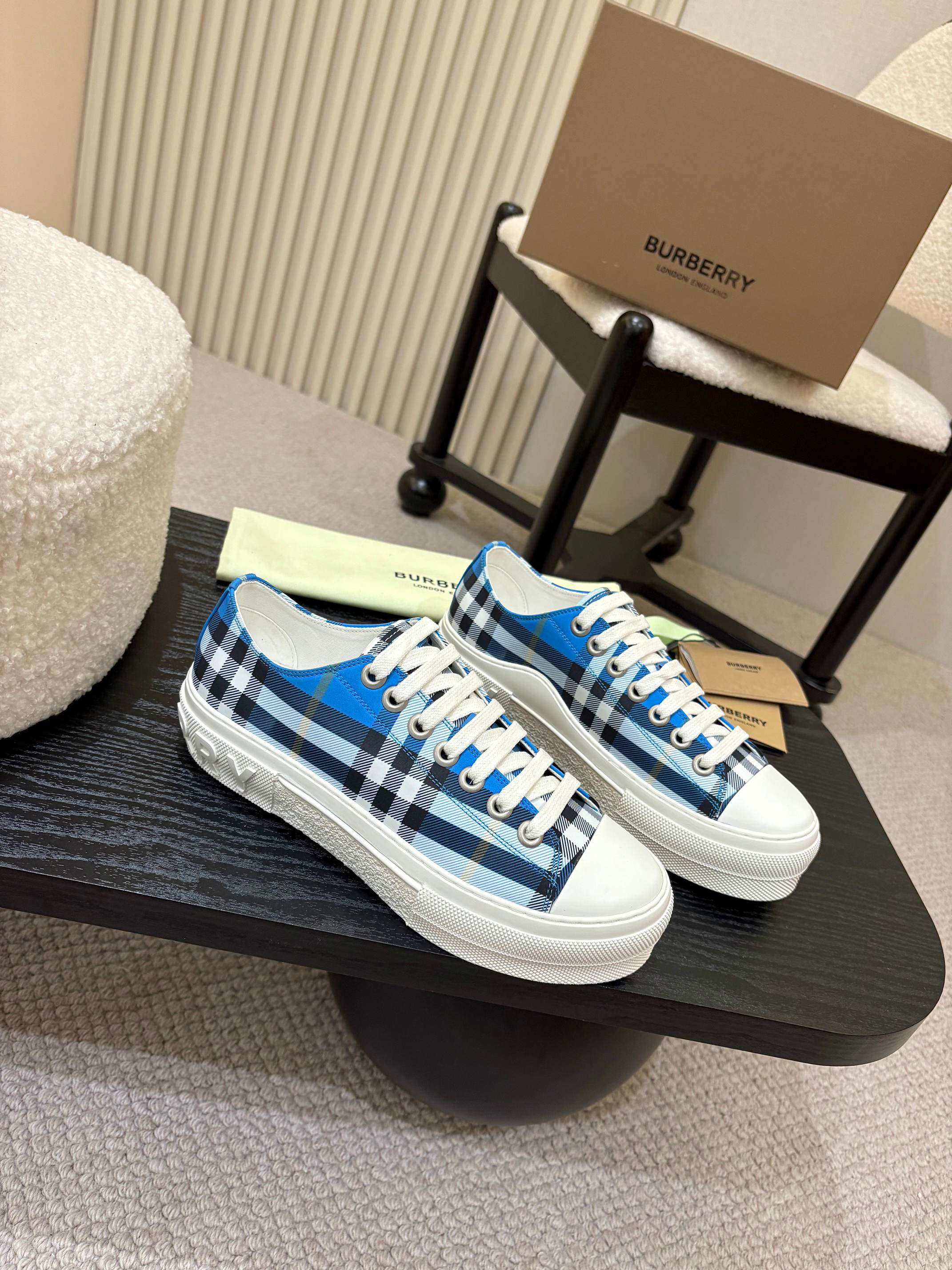 Burberry low-top sneakers with blue plaid uppers and white cupsole