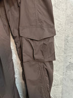 Brown cargo pants with side pocket panel and tapered leg
