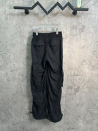 Black cargo pants with elastic waist and multiple side pockets