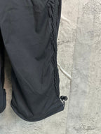 Black cargo pants side seam and ankle drawcord hem