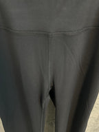 Black pants with front seam and leg opening detail