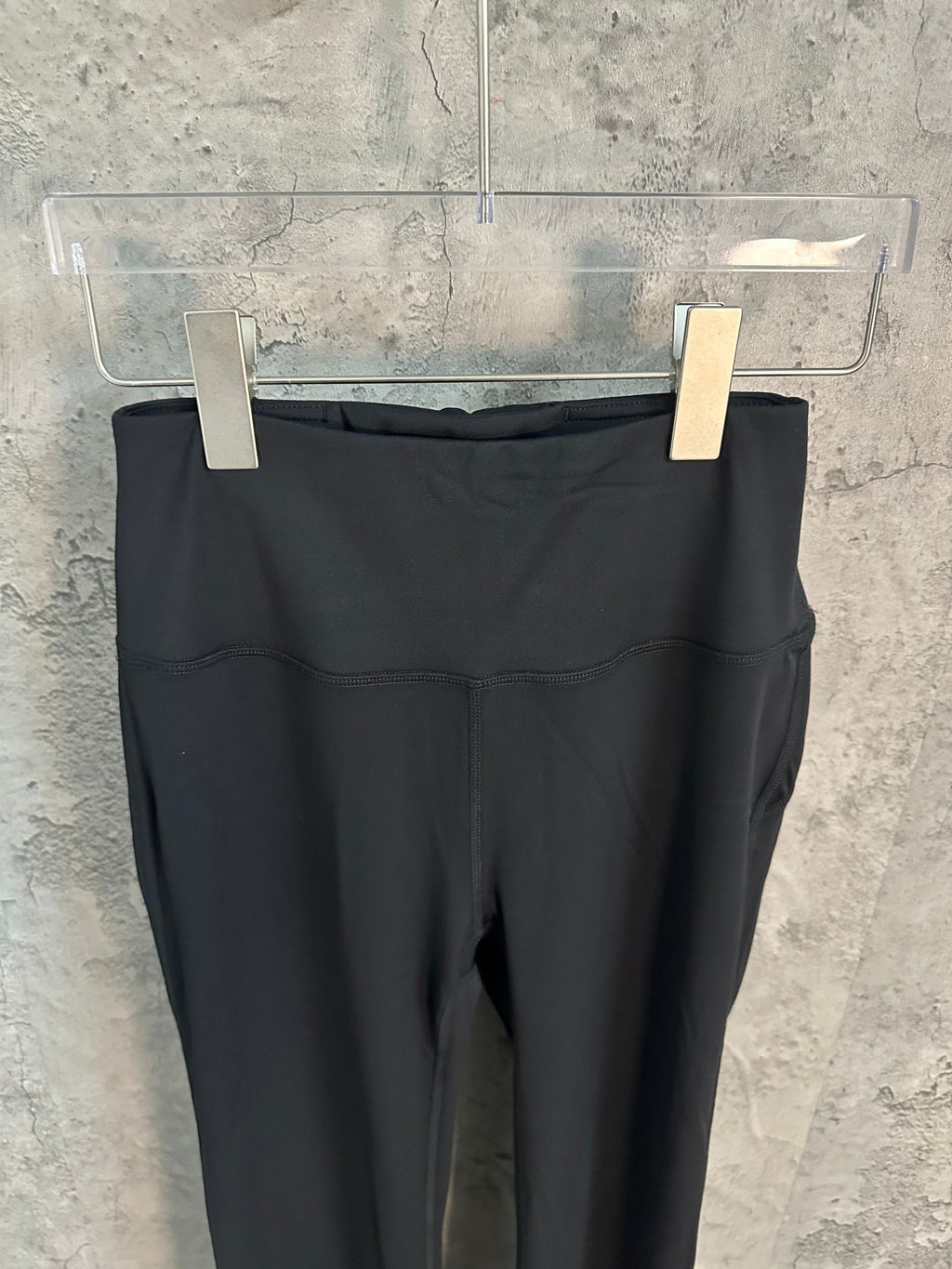 Black trousers waistband and front yoke seam