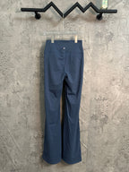 Blue straight-leg pants with elastic waistband and front seam, hanging for view