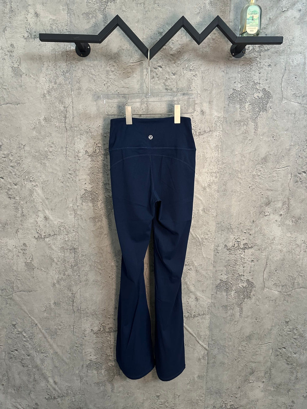 Ralph Lauren navy athletic pants, front view with small waist logo