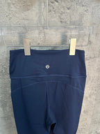 Navy athletic pants front view with waist logo and wide waistband