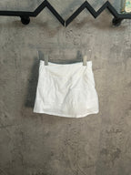 White A-line skirt with pleated front and elastic waistband