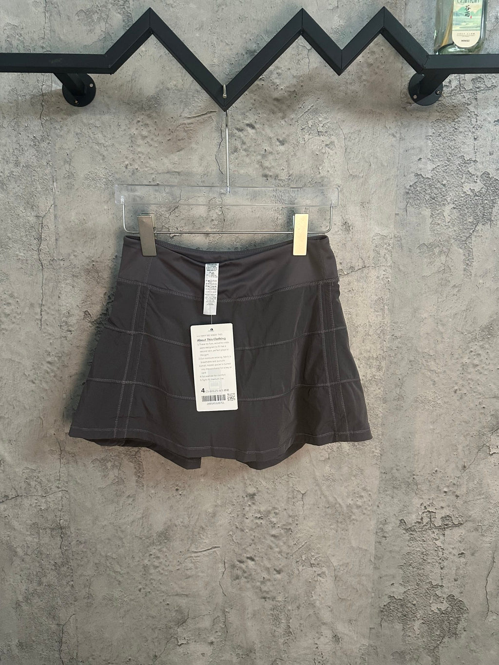 Ralph Lauren skirt with front pleat panels and tags, dark gray