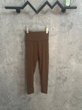 Brown pants on hanger, straight leg with elastic waistband