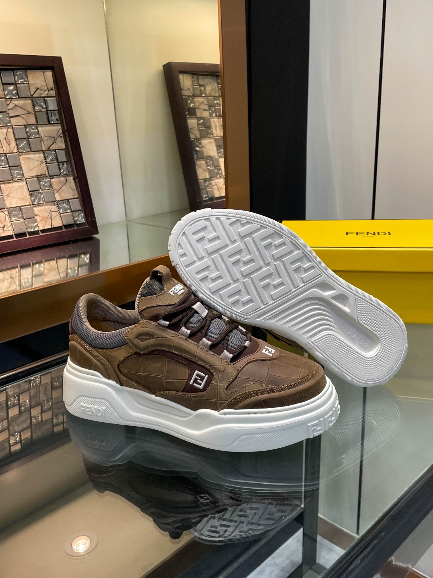 Brown Fendi sneakers with embossed tread sole in white