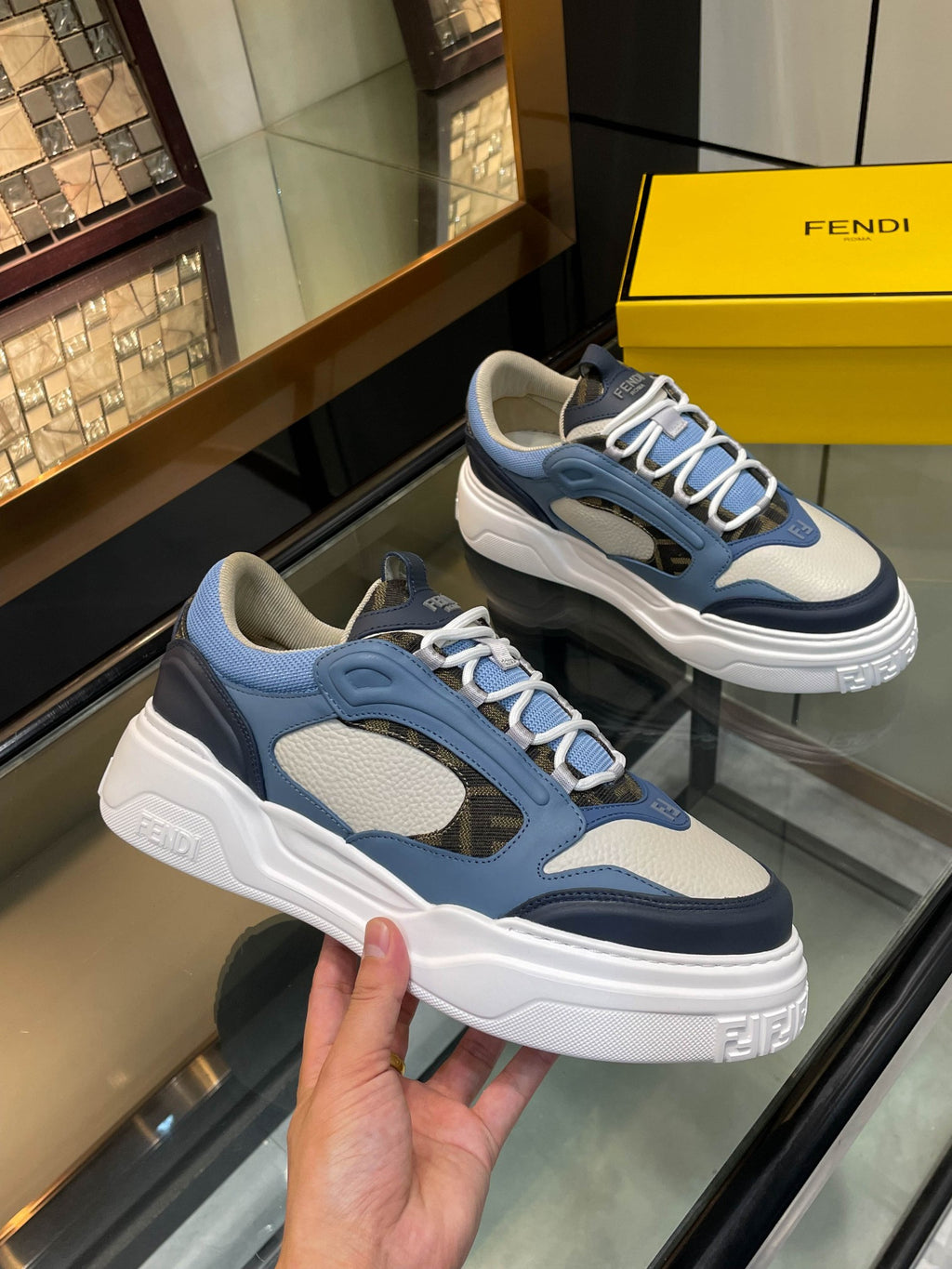 Fendi unisex sneakers in blue with white platform sole, side strap detail