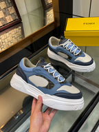 Fendi unisex sneakers in blue with white platform sole, side strap detail