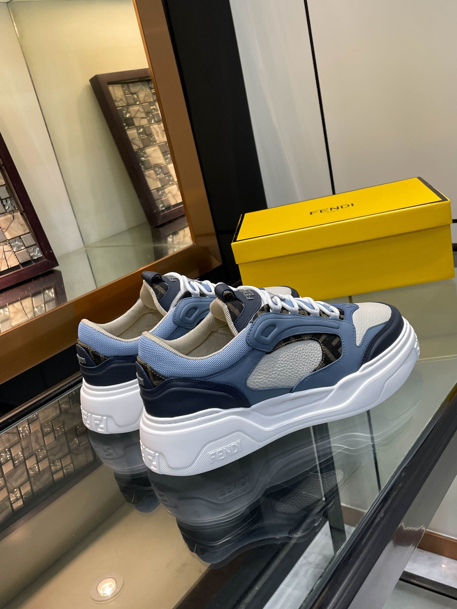 Fendi unisex sneakers with rear logo patch, blue upper and white thick sole