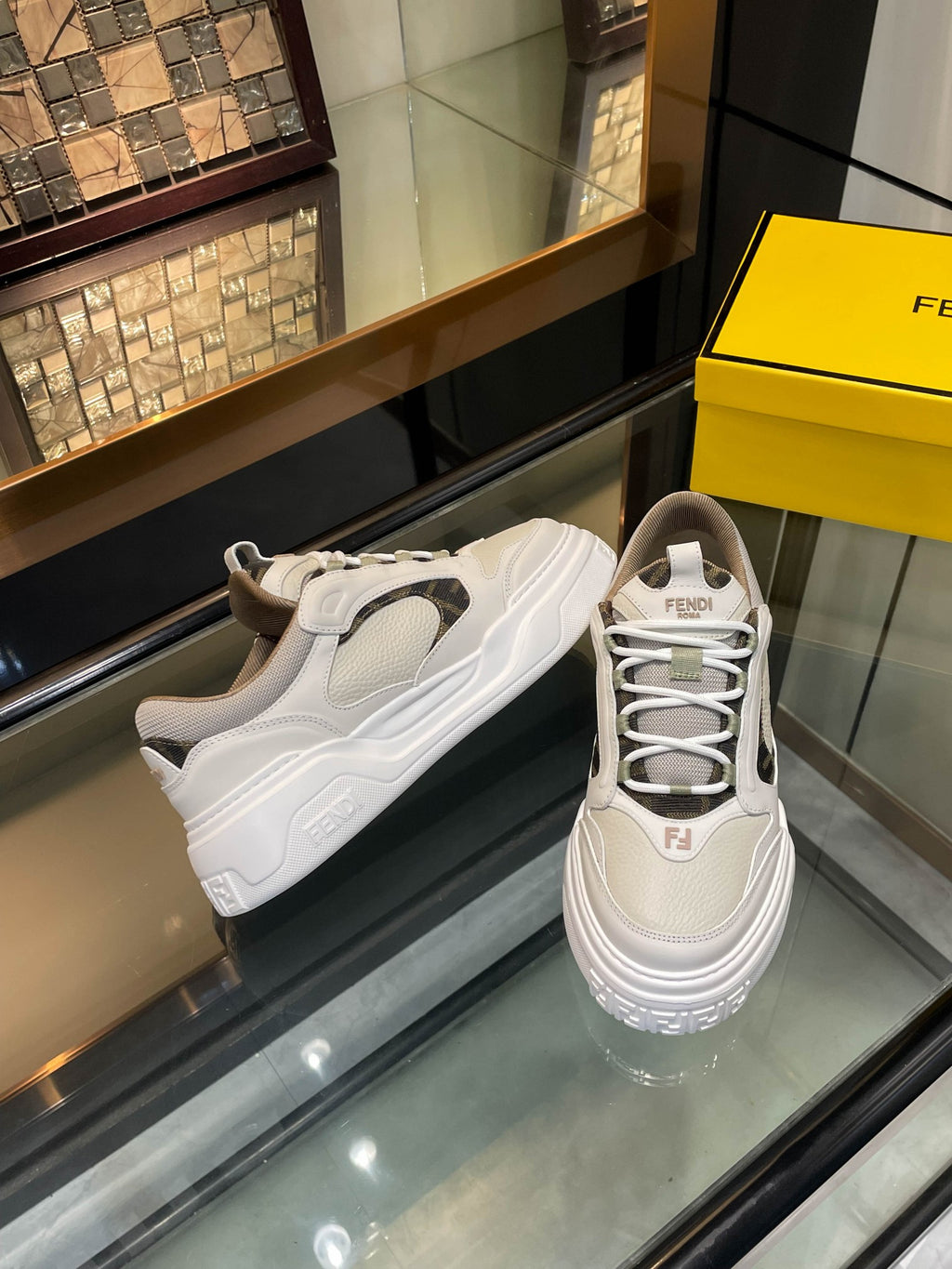 White and gray platform sneakers with lace-up design and cushioned midsole