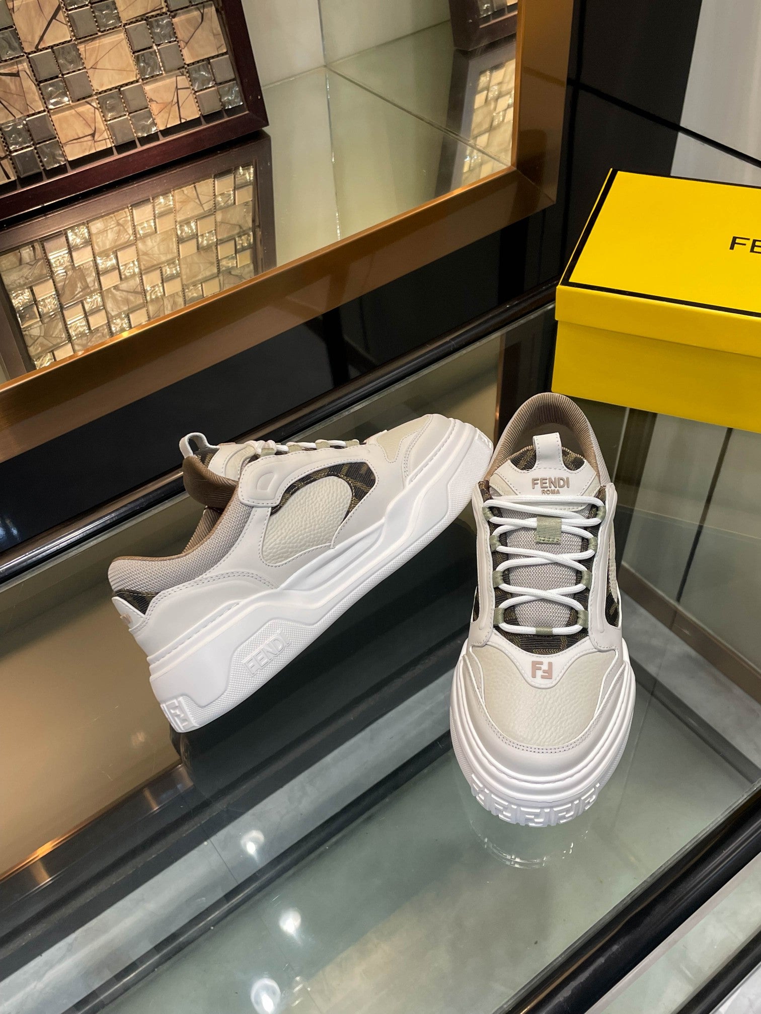 White and gray platform sneakers with lace-up design and cushioned midsole