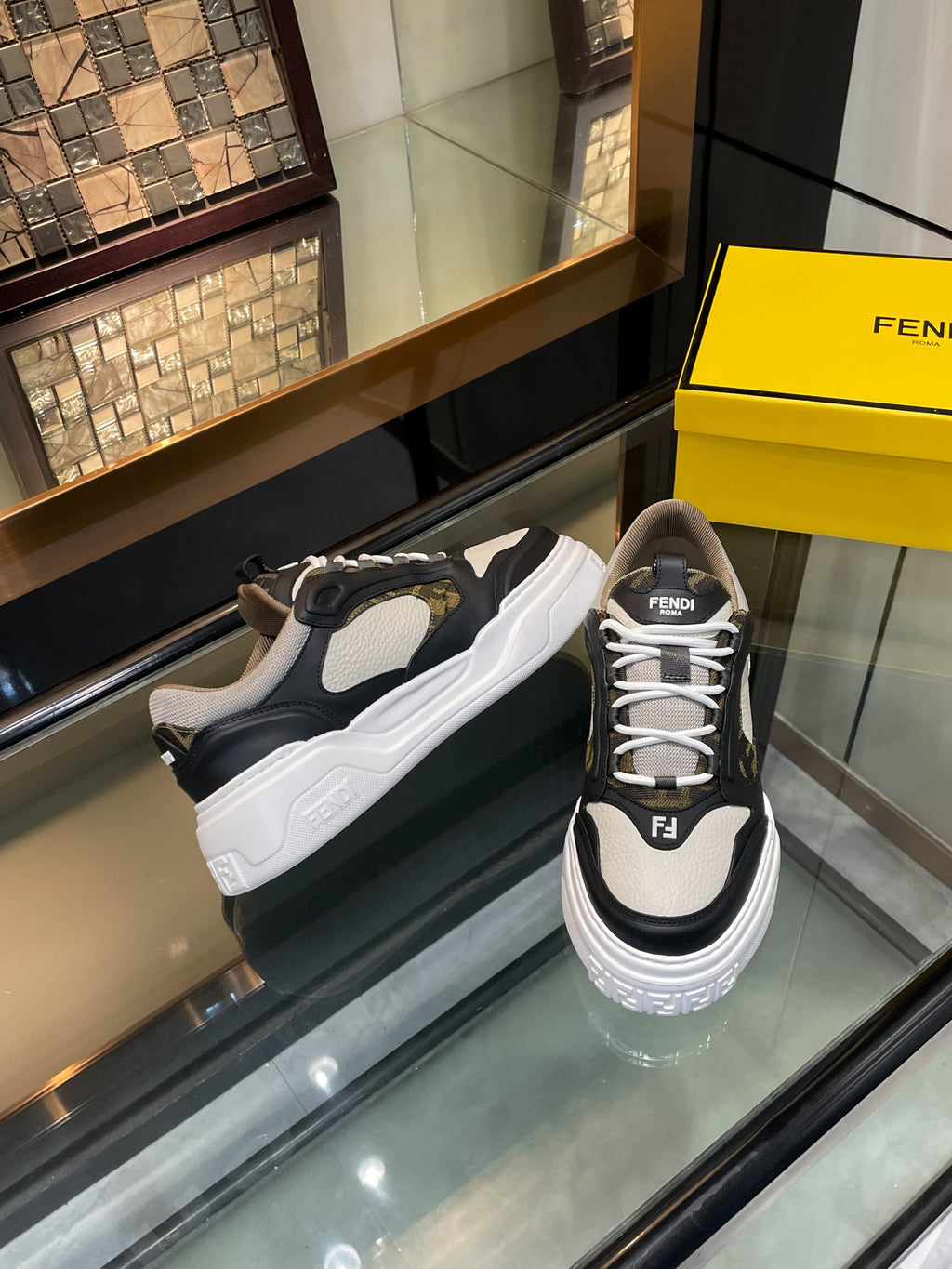 Dark and white unisex sneakers on display, lace-up with textured side panels