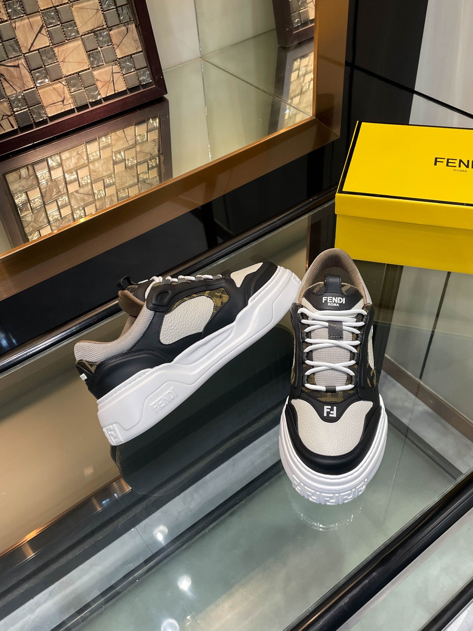 Dark and white unisex sneakers on display, lace-up with textured side panels