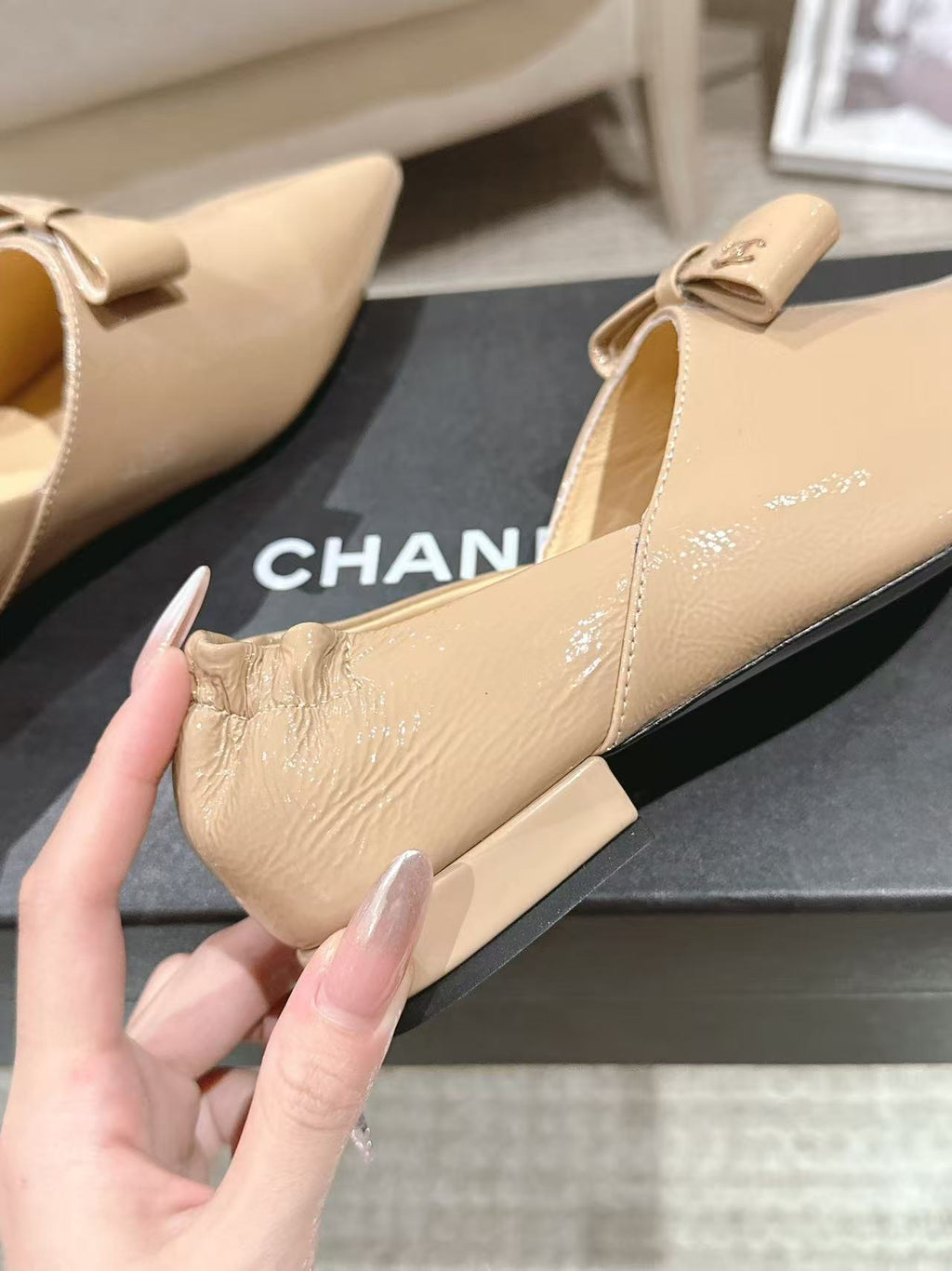 Chanel beige pointed-toe flat with bow, textured vamp, low heel
