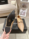Chanel ladies patent flats, pointed toe with bow and scalloped collar, beige