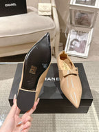 Chanel ladies patent flats, pointed toe with bow and scalloped collar, beige