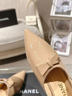 Chanel beige patent flat shoe with bow strap, pointed toe, low heel