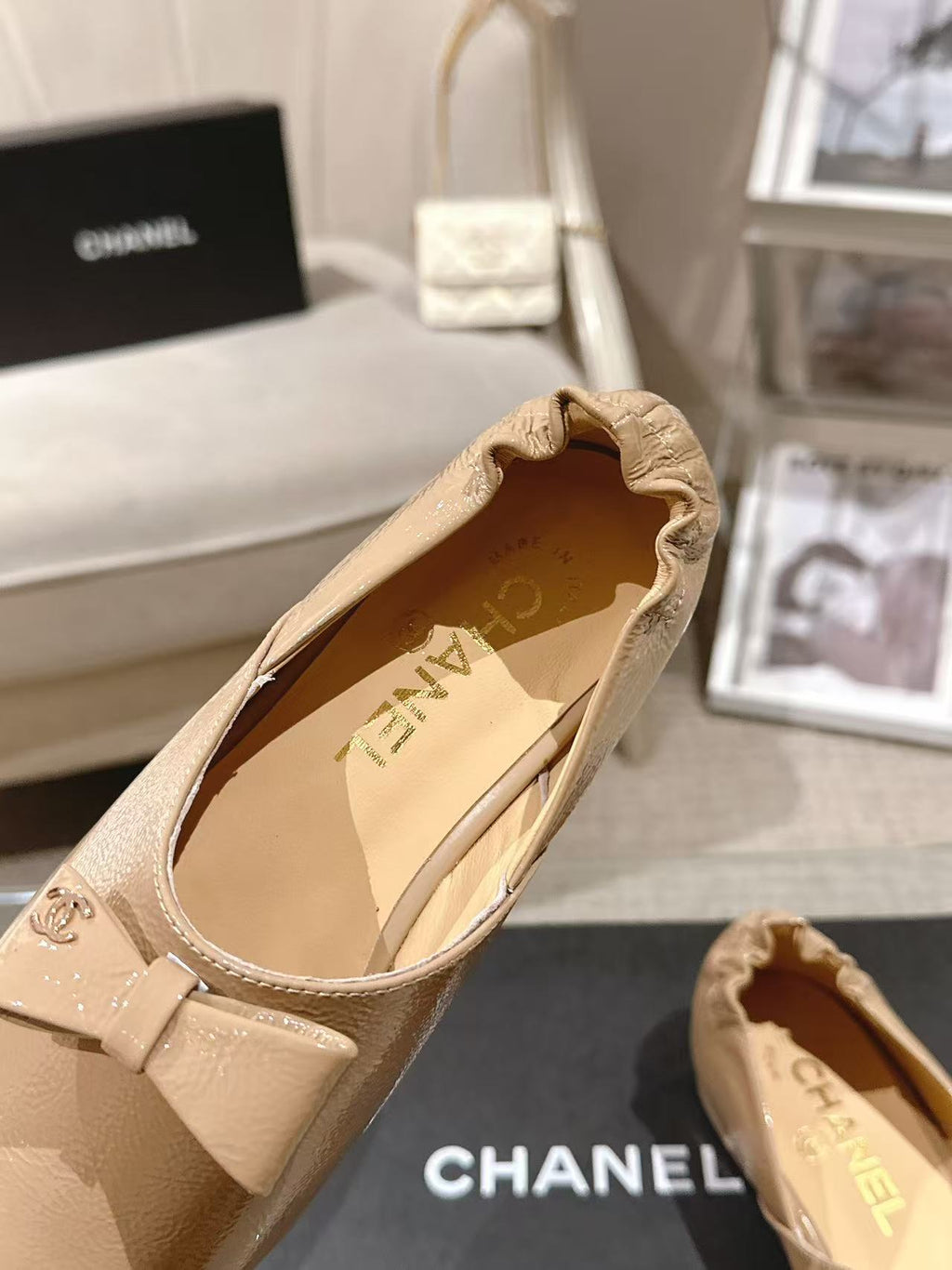 Chanel beige patent flat shoe with cutout bow detail, pointed toe
