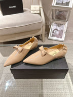 Chanel beige patent flats pair with bow straps, pointed toe, low heel