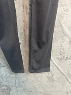 Black leggings with smooth fabric and side seam detail