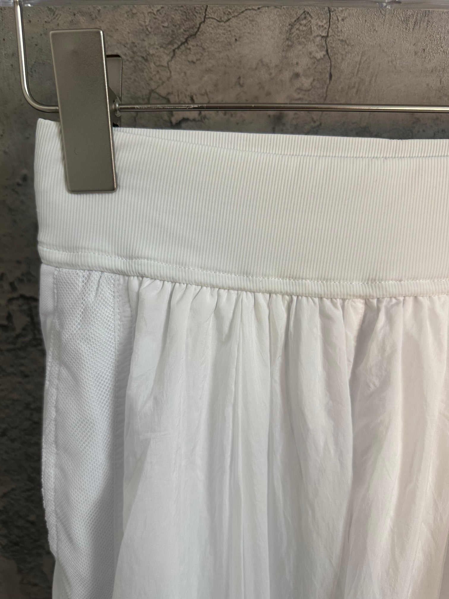 White skirt front with elastic waistband and gathered fabric