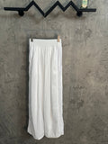 White skirt with elastic waistband and pleated panels