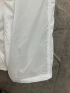 White skirt fabric panel with vertical seam and smooth drape