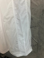 White skirt with gathered lower hem and vertical seam lines