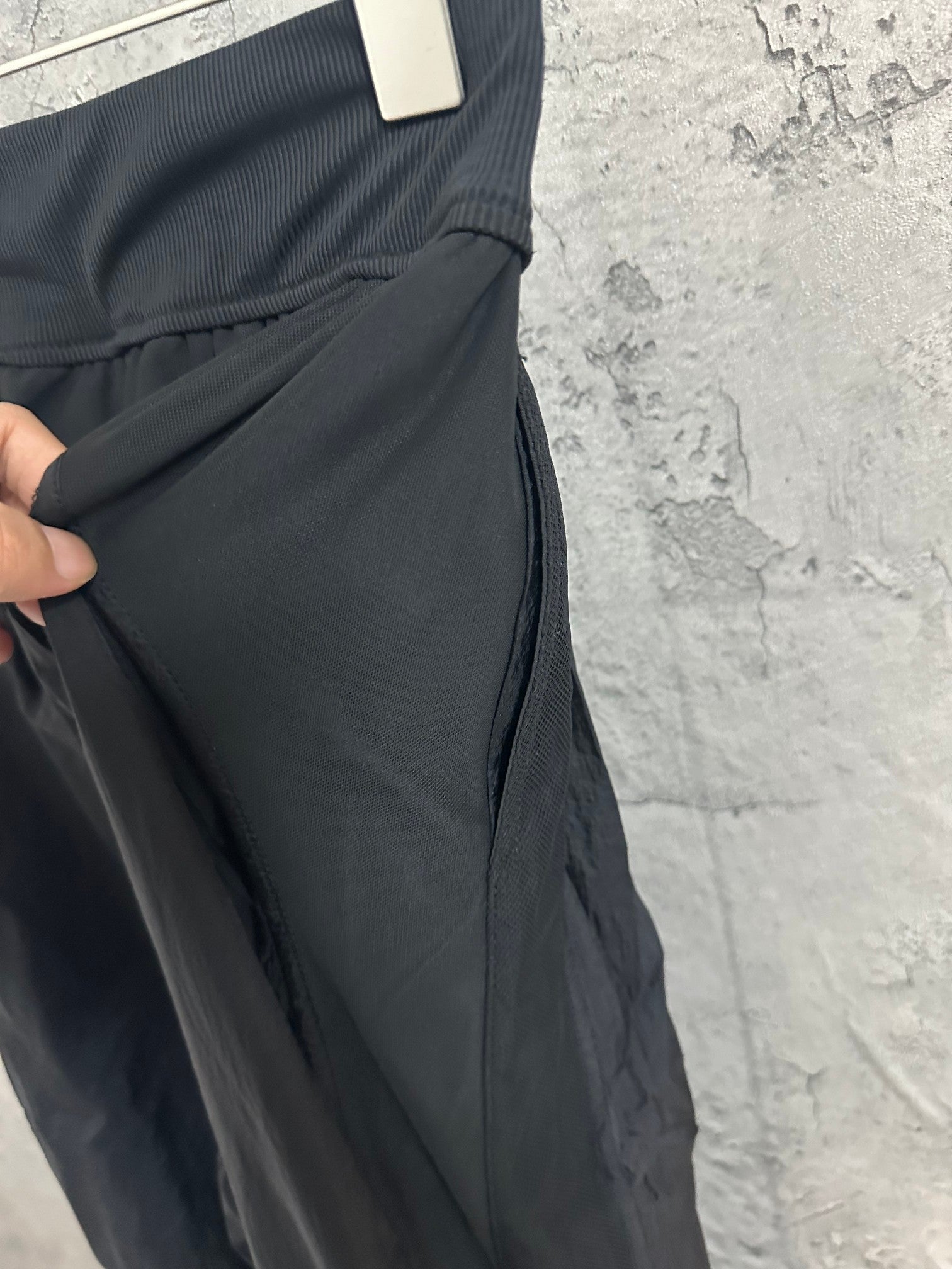 Dark pants with side seam panel and relaxed wide leg