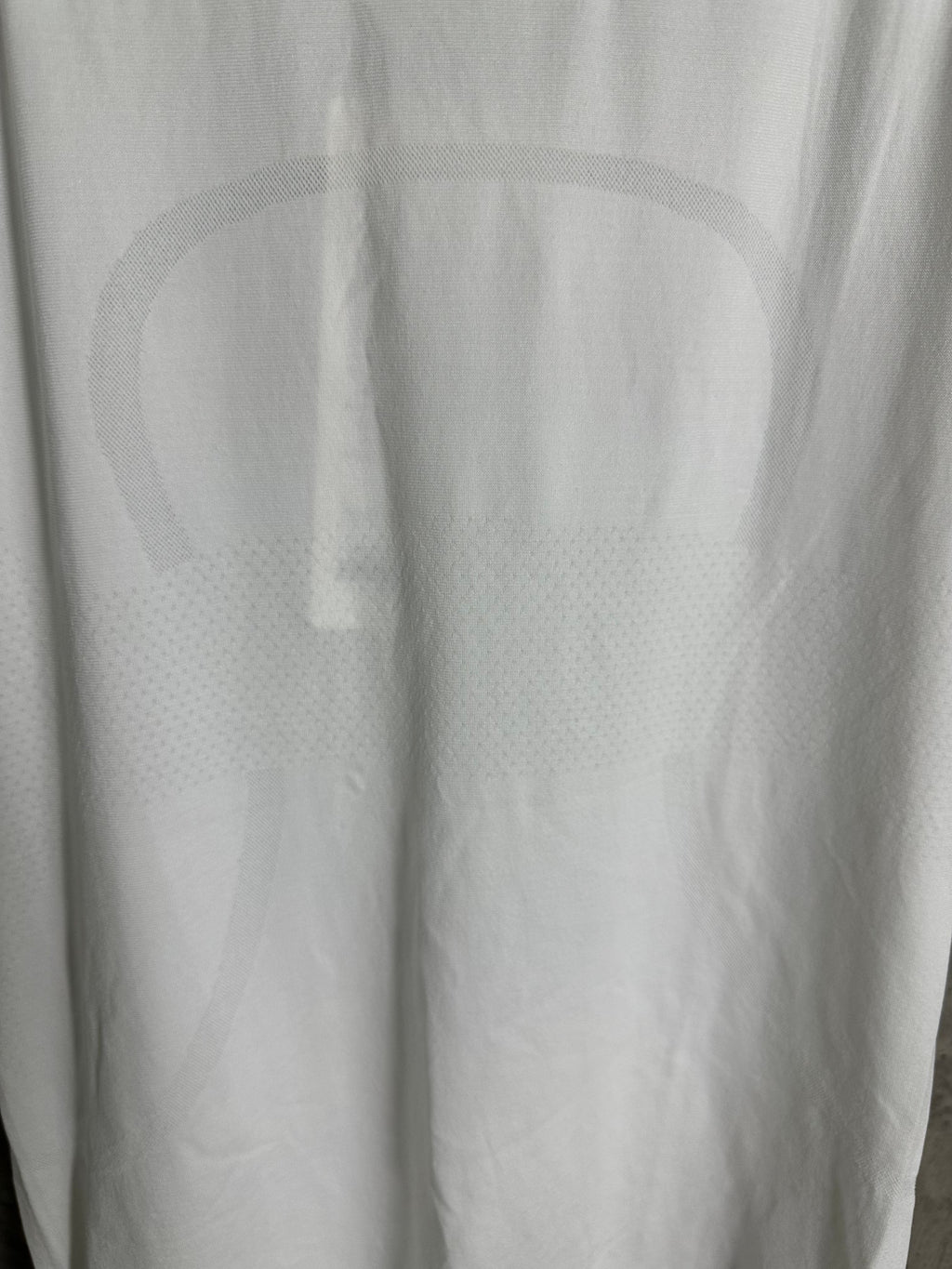 White crew-neck T-shirt front with subtle textured fabric