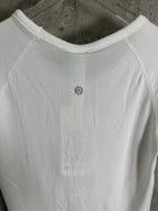 White crew-neck T-shirt with tonal logo at center chest