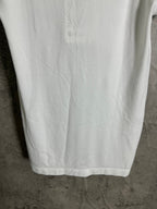 White T-shirt back hem with textured vertical paneling and straight bottom