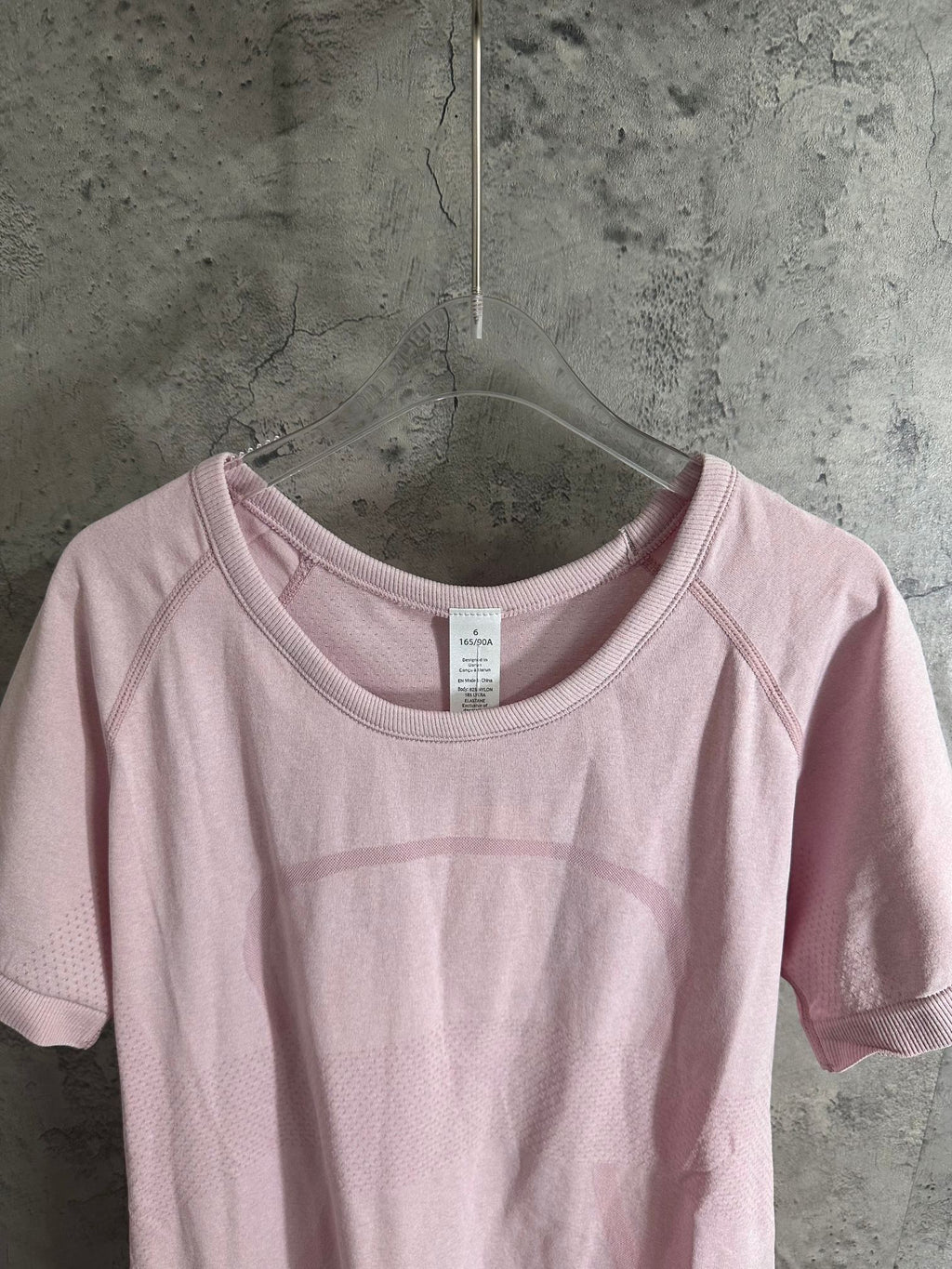 Pink raglan T-shirt, crew neck, interior tag visible