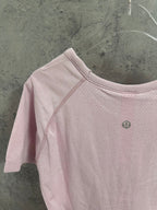 Pink raglan T-shirt with crew neck and small chest logo badge