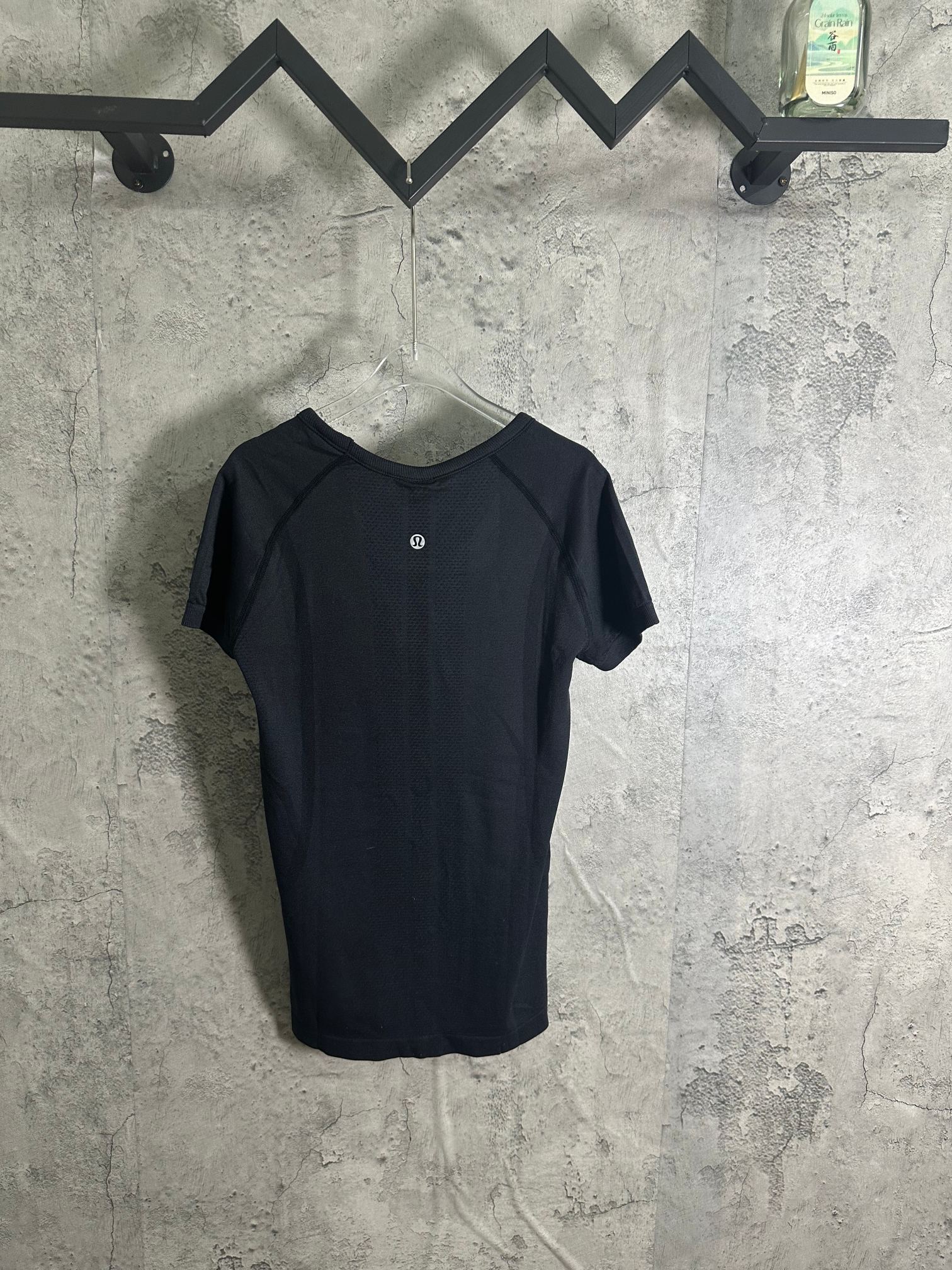 Dark heather logo crew-neck T-shirt with short raglan sleeves and seam detail