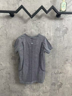 Kids gray heather T-shirt back view with vertical textured panel and small button