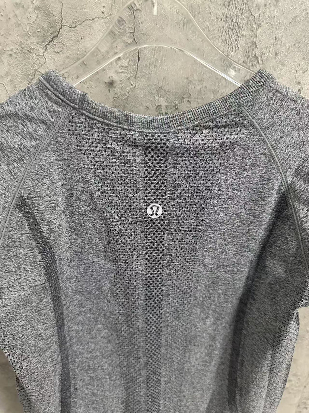 Kids gray heather T-shirt back with small round logo on upper back