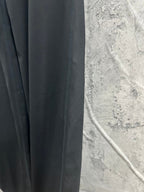 Black pants fabric with side seam stitching and vertical panel