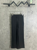 Dark drawstring pants with relaxed straight legs and front seam details
